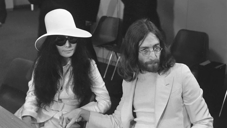 John Lennon's glasses : Lennon and Yoko Ono, posing together in 1969, with Lennon wearing his iconic round glasses.