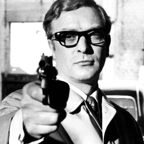 Michael Caine wearing Oliver Goldsmith Lord glasses, the iconic 1960s style