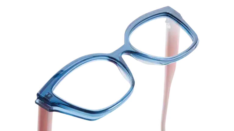 FACE À FACE eyewear, OFFSET 1 model from the COLOUR LAB / OVER LAP collection, featuring a translucent blue frame with contrasting temples.