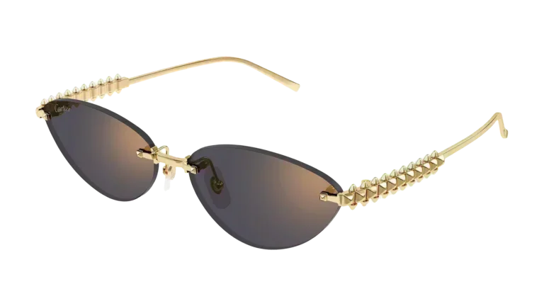 Gafas de sol Clash de Cartier 2025 modelo CT0543S con montura dorada, clavos móviles y lentes en forma de ojo de gato