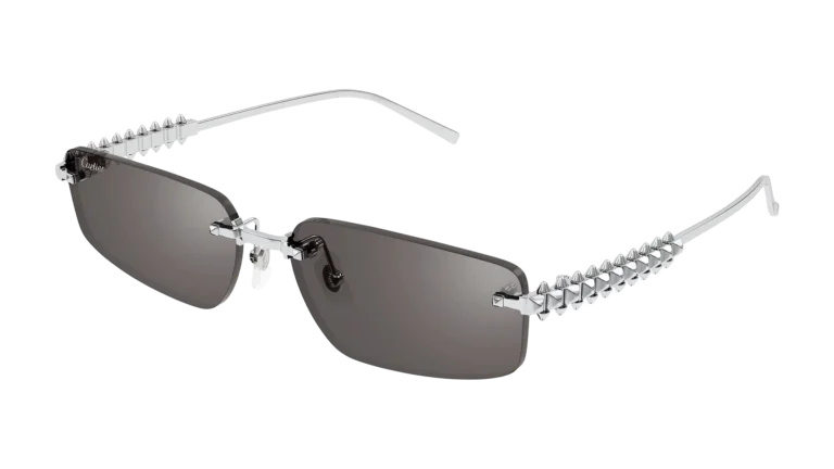 Monture solaire Clash de Cartier 2025 CT0544S en métal platine avec verres rectangulaires et clous mobiles sur les branches