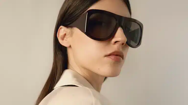 Oversized sunglasses women 2025 with dark brown acetate frame, worn with a cream outfit in a minimal and confident style